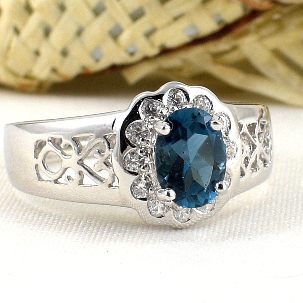 แหวนเงินแท้ราคาถูกชุบทองคำขาว ลอนดอนบลูโทปาซแท้ 0.95 กะรัต เพชรCZ 0.18 กะรัต งานประณีตสวยงาม สั่งผลิตค่ะ