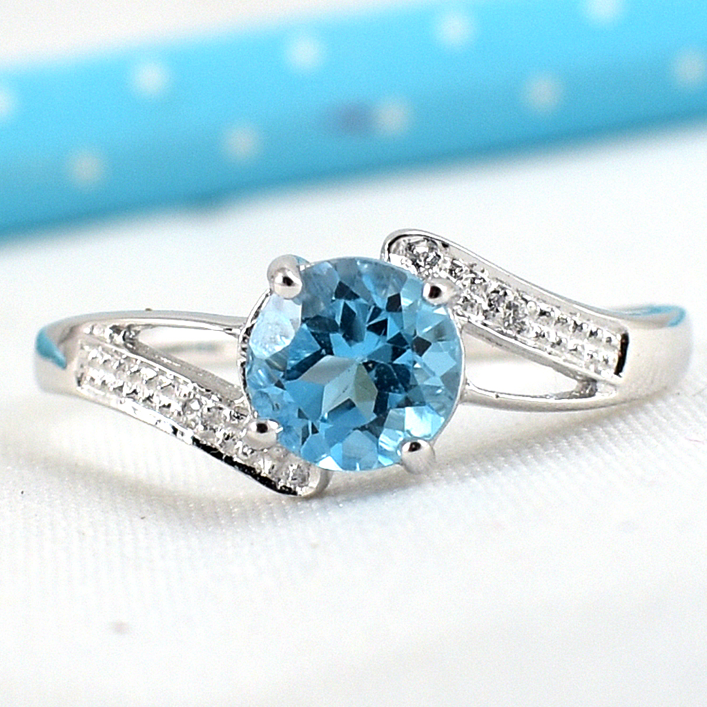 แหวนเงินแท้ราคาถูกชุบทองคำขาว สวิสบลูโทปาซแท้ 0.80 กะรัต เพชรCZ 0.02 กะรัต งานประณีตสวยงาม สั่งผลิตค่ะ