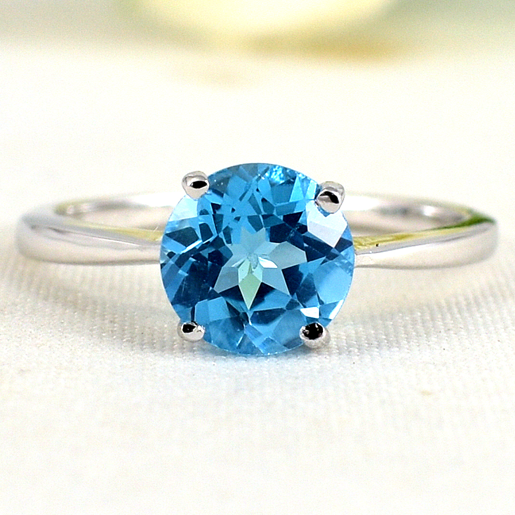 แหวนเงินแท้ราคาถูกชุบทองคำขาว สวิสบลูโทปาซแท้ 1.65 กะรัต งานประณีตสวยงาม สั่งผลิตค่ะ