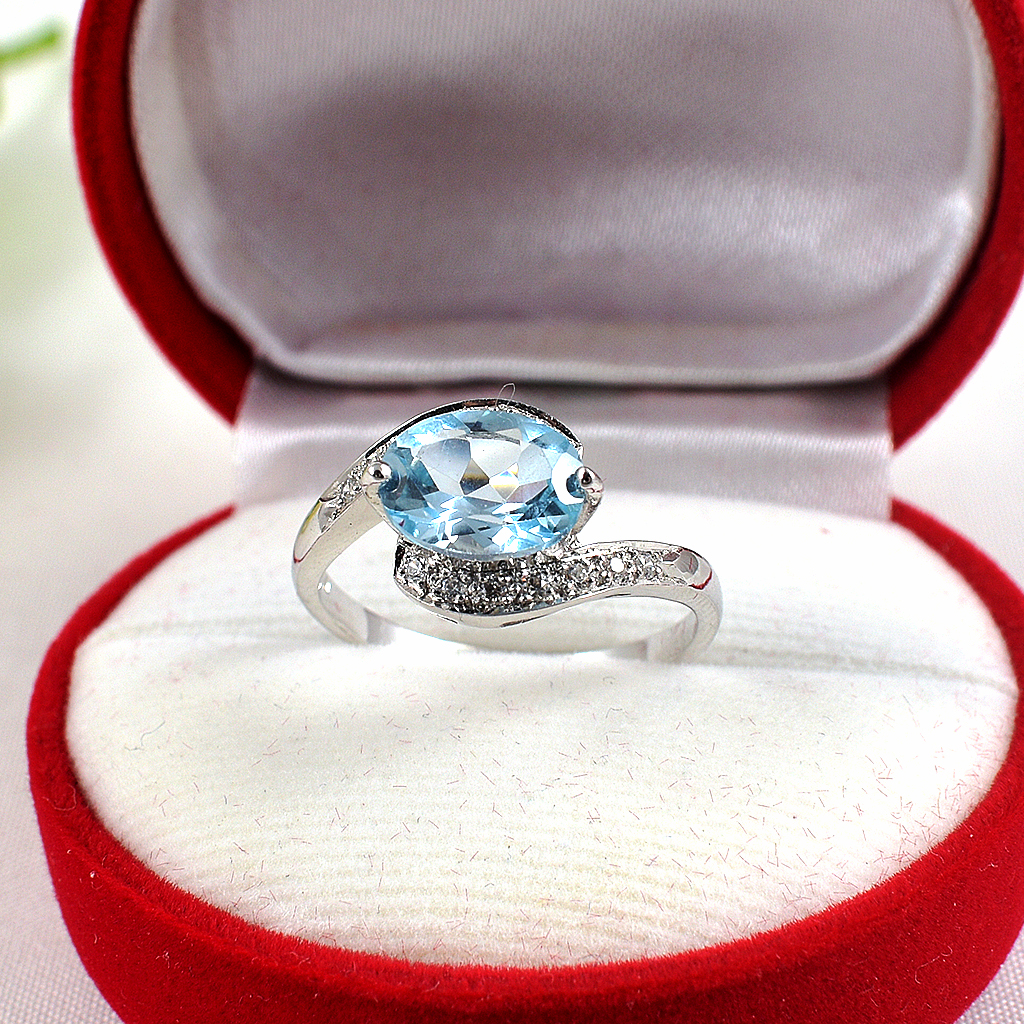 แหวนเงินแท้ราคาถูกชุบทองคำขาว สกายบลูโทปาซแท้ 2.29 กะรัต เพชรCZ 0.14 กะรัต งานประณีตสวยงาม สั่งผลิตค่ะ