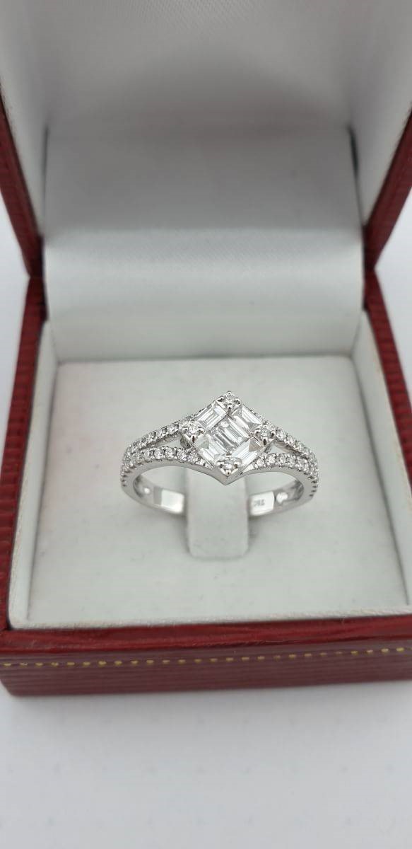 สั่งผลิตเพชรเบลเยี่ยมคัท แหวนแต่งงาน แหวนหมั้น ใส่เที่ยว ออกงาน แหวนทองขาว 18K เพชรแท้ 0.60 กะรัต 3.52 กรัม น้ำ 99 ราคาถูกมาก มีใบรับประกันค่ะ