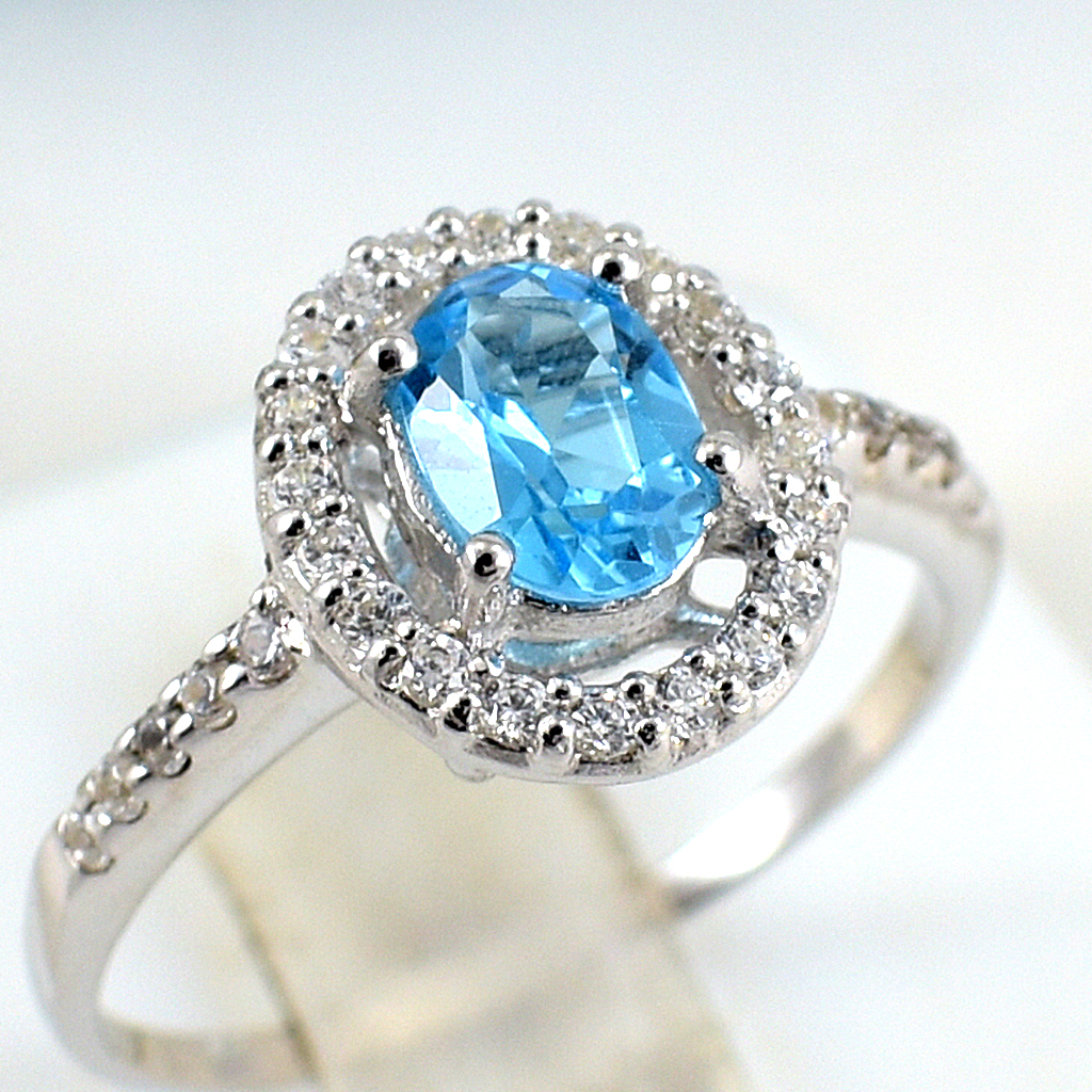 แหวนเงินแท้ราคาถูกชุบทองคำขาว สวิสบลูโทปาซแท้ 0.95 กะรัต เพชรCZ 0.30 กะรัต งานประณีตสวยงาม สั่งผลิตค่ะ