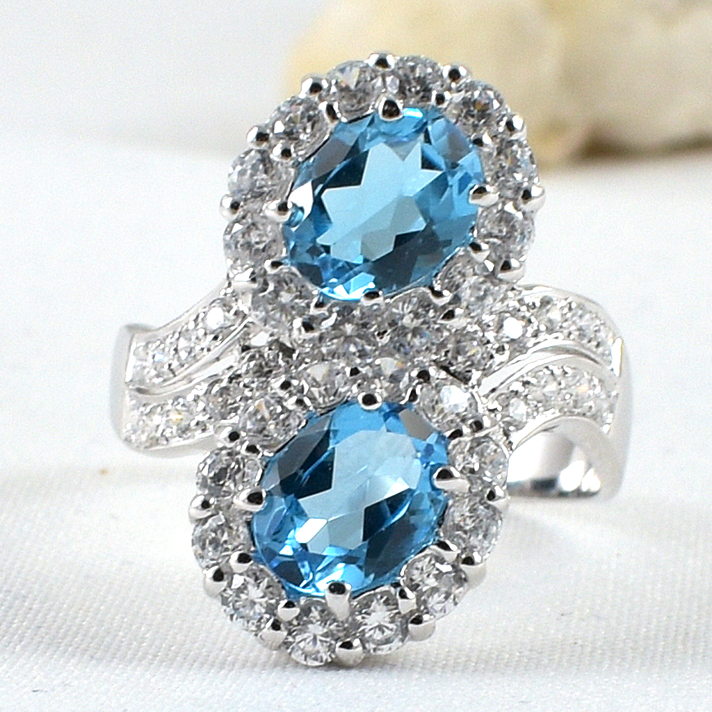 แหวนเงินแท้ราคาถูกชุบทองคำขาว สวิสบลูโทปาซแท้ 3.70 กะรัต เพชรCZ 1.23 กะรัต งานประณีตสวยงาม สั่งผลิตค่ะ