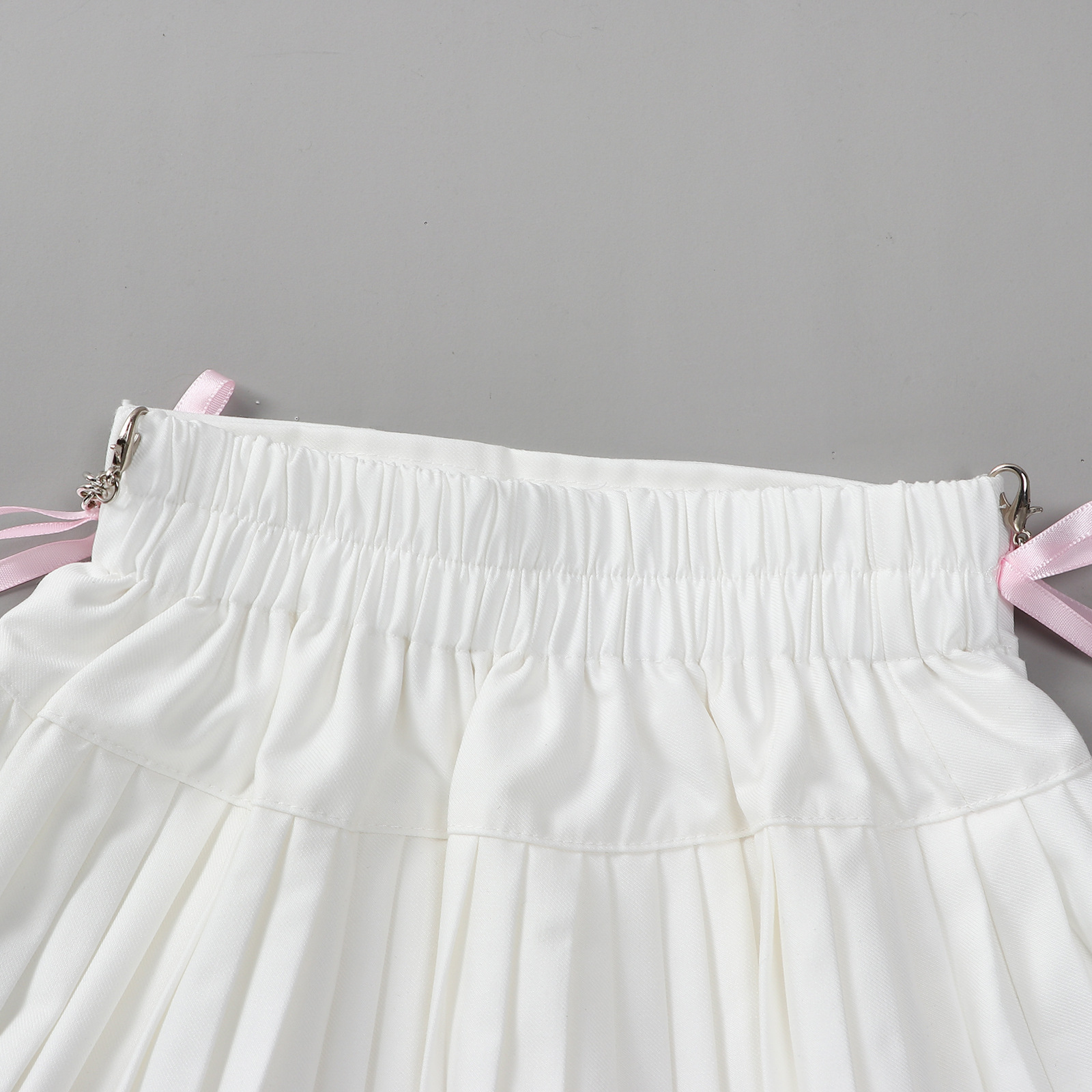 กระโปรง เด็กผู้หญิง อัดพลีส สีพื้นแยกสร้อม**พร้อมแบบโบว์ชมพู