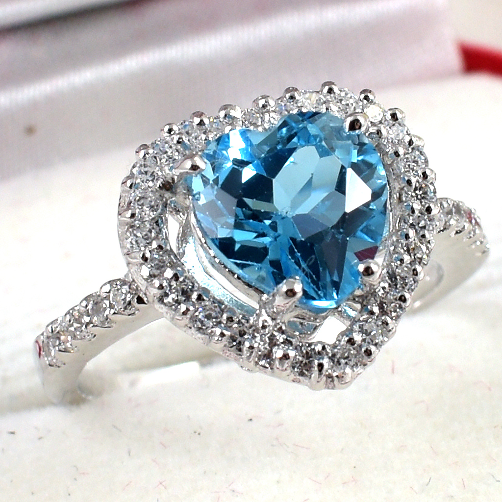 แหวนเงินแท้ราคาถูกชุบทองคำขาว สวิสบลูโทปาซแท้ 2.45 กะรัต เพชรCZ 0.252 กะรัต งานประณีตสวยงาม สั่งผลิตค่ะ