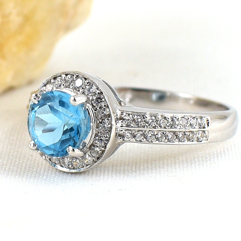 แหวนเงินแท้ราคาถูกชุบทองคำขาว สวิสบลูโทปาซแท้ 1.65 กะรัต เพชรCZ 0.51 กะรัต งานประณีตสวยงาม สั่งผลิตค่ะ