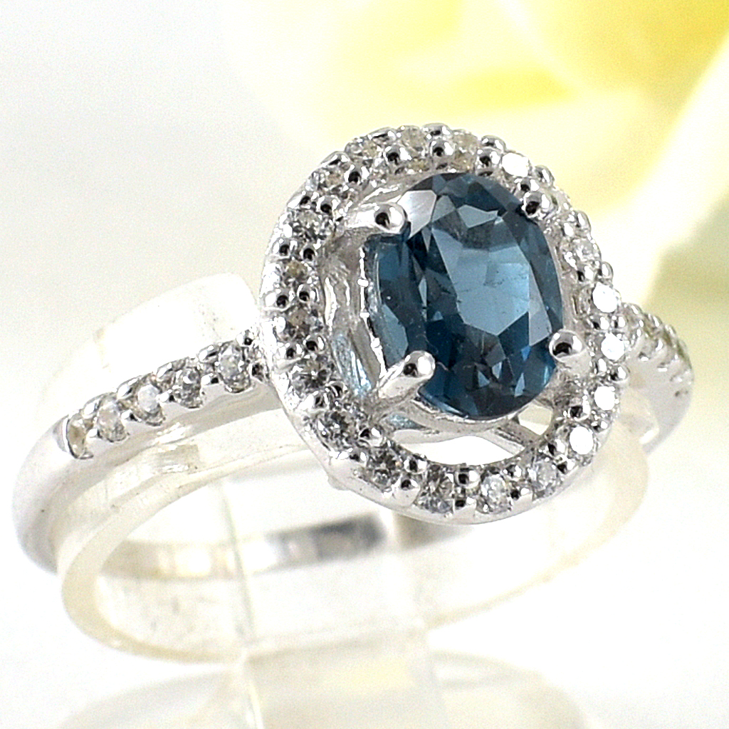 แหวนเงินแท้ราคาถูกชุบทองคำขาว ลอนดอนบลูโทปาซแท้ 0.95 กะรัต เพชรCZ 0.30 กะรัต งานประณีตสวยงาม สั่งผลิตค่ะ