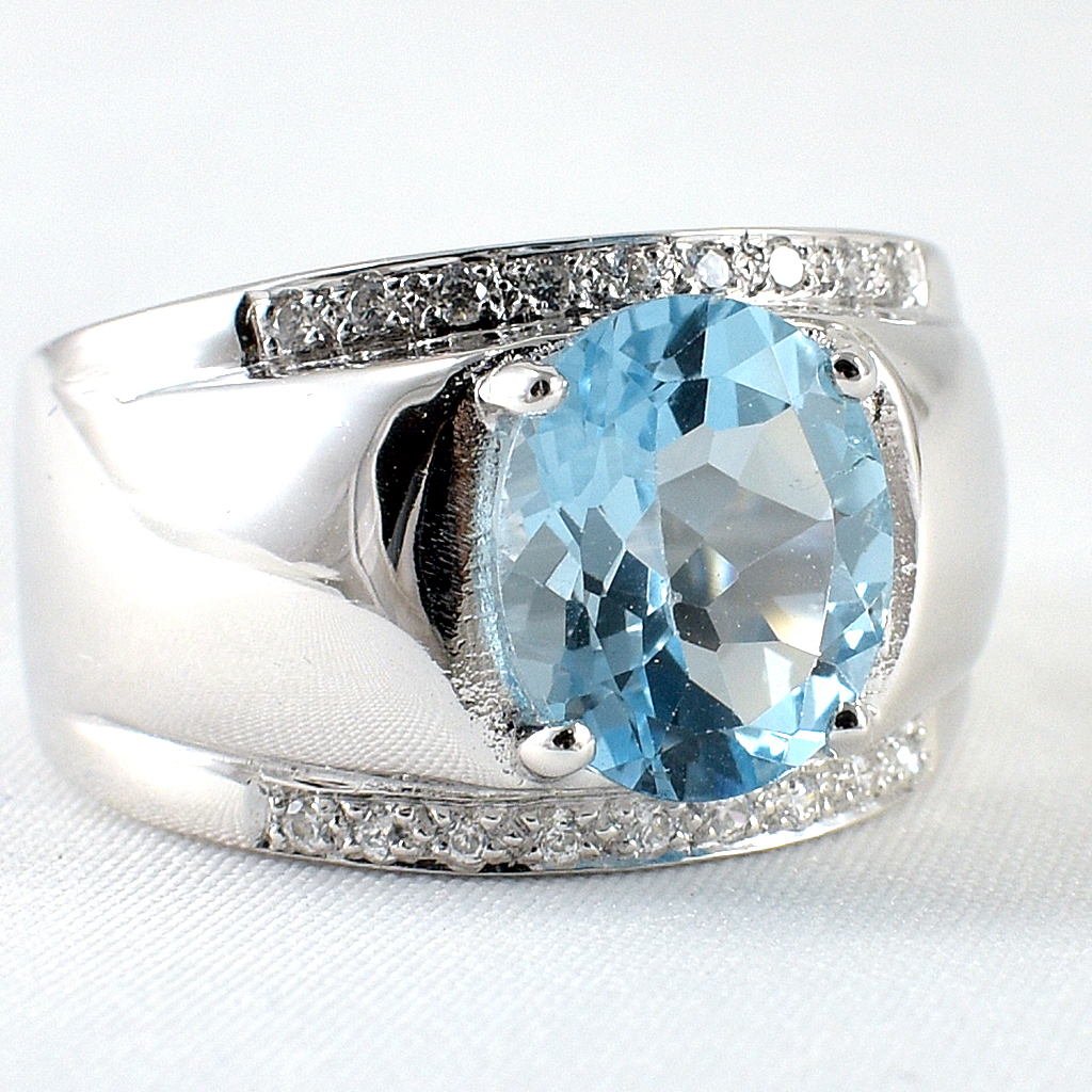 แหวนเงินแท้ราคาถูกชุบทองคำขาว สกายบลูโทปาซแท้ 4.50 กะรัต เพชรCZ 0.18 กะรัต งานประณีตสวยงาม สั่งผลิตค่ะ