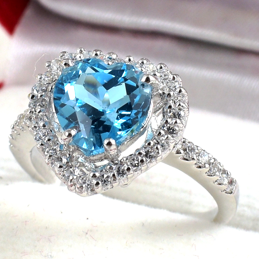 แหวนเงินแท้ราคาถูกชุบทองคำขาว สวิสบลูโทปาซแท้ 2.45 กะรัต เพชรCZ 0.252 กะรัต งานประณีตสวยงาม สั่งผลิตค่ะ