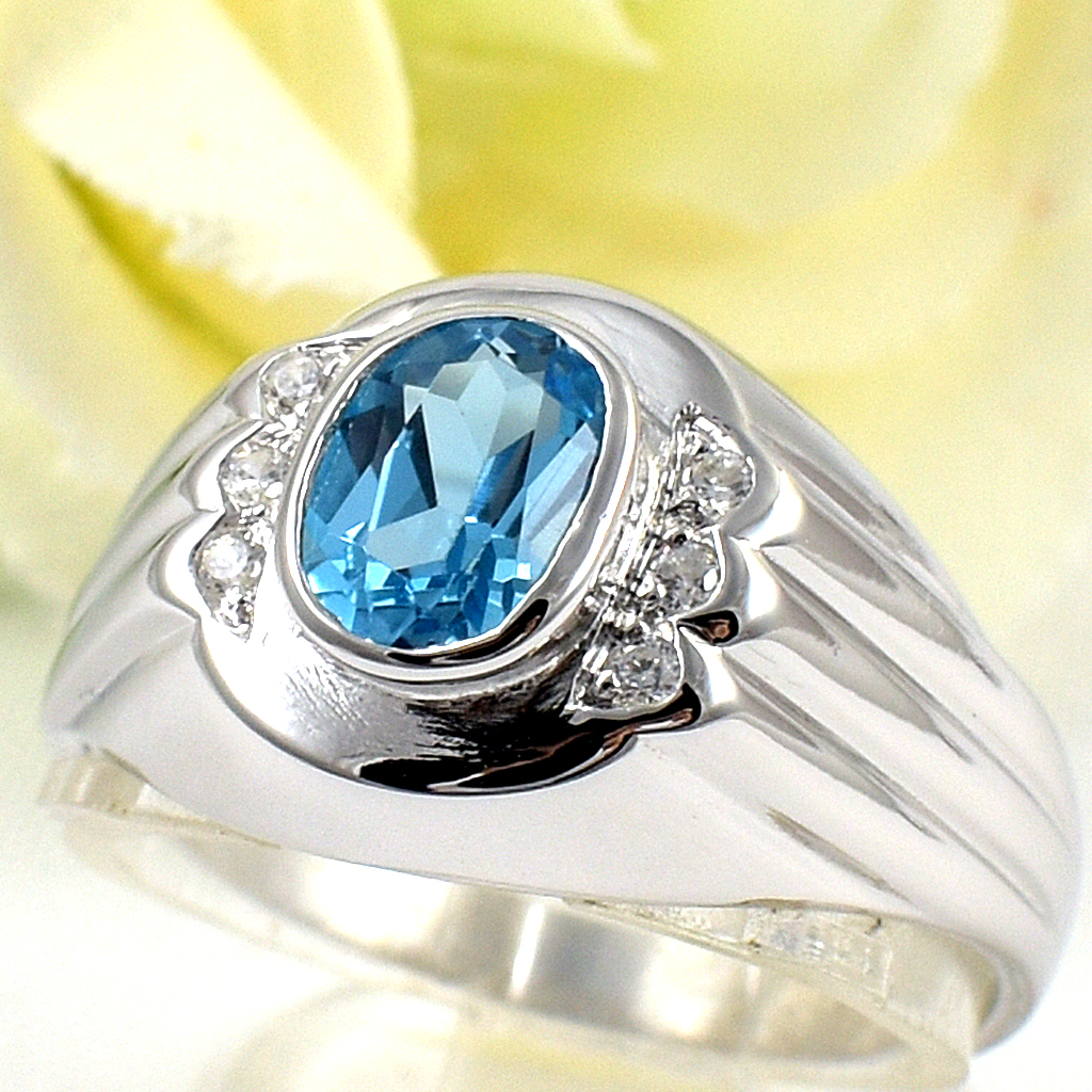 แหวนเงินแท้ราคาถูกชุบทองคำขาว สวิสบลูโทปาซแท้ 0.95 กะรัต เพชรCZ 0.06 กะรัต งานประณีตสวยงาม สั่งผลิตค่ะ