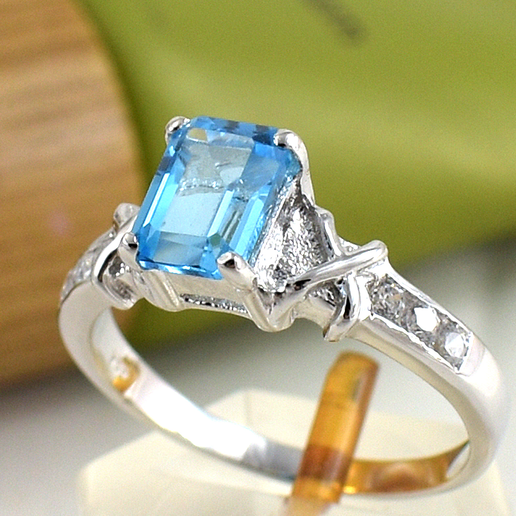 แหวนเงินแท้ราคาถูกชุบทองคำขาว สวิสบลูโทปาซแท้ 1.25 กะรัต เพชรCZ 0.18 กะรัต งานประณีตสวยงาม สั่งผลิตค่ะ