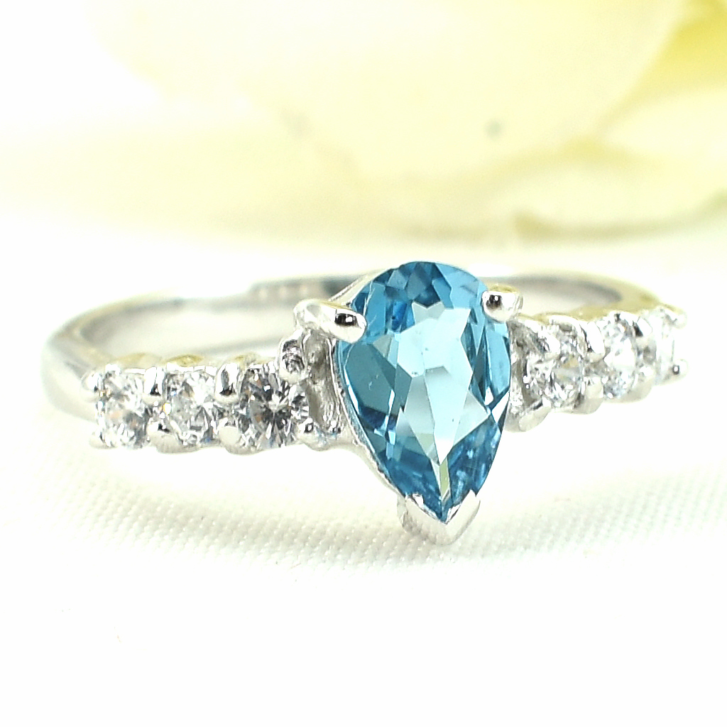 แหวนเงินแท้ราคาถูกชุบทองคำขาว สวิสบลูโทปาซแท้ 1.35 กะรัต เพชรCZ 0.30 กะรัต งานประณีตสวยงาม สั่งผลิตค่ะ