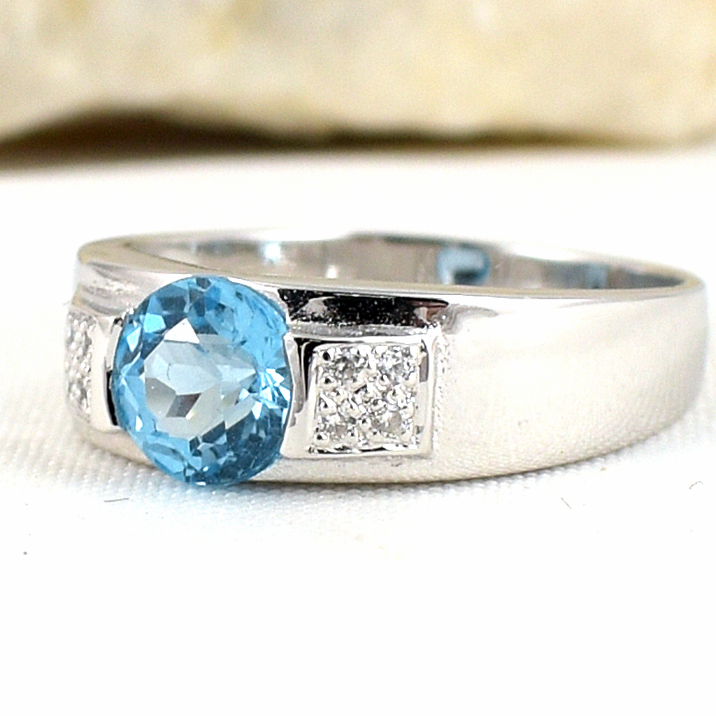 แหวนเงินแท้ราคาถูกชุบทองคำขาว สวิสบลูโทปาซแท้ 1.0 กะรัต เพชรCZ 0.056 กะรัต งานประณีตสวยงาม สั่งผลิตค่ะ