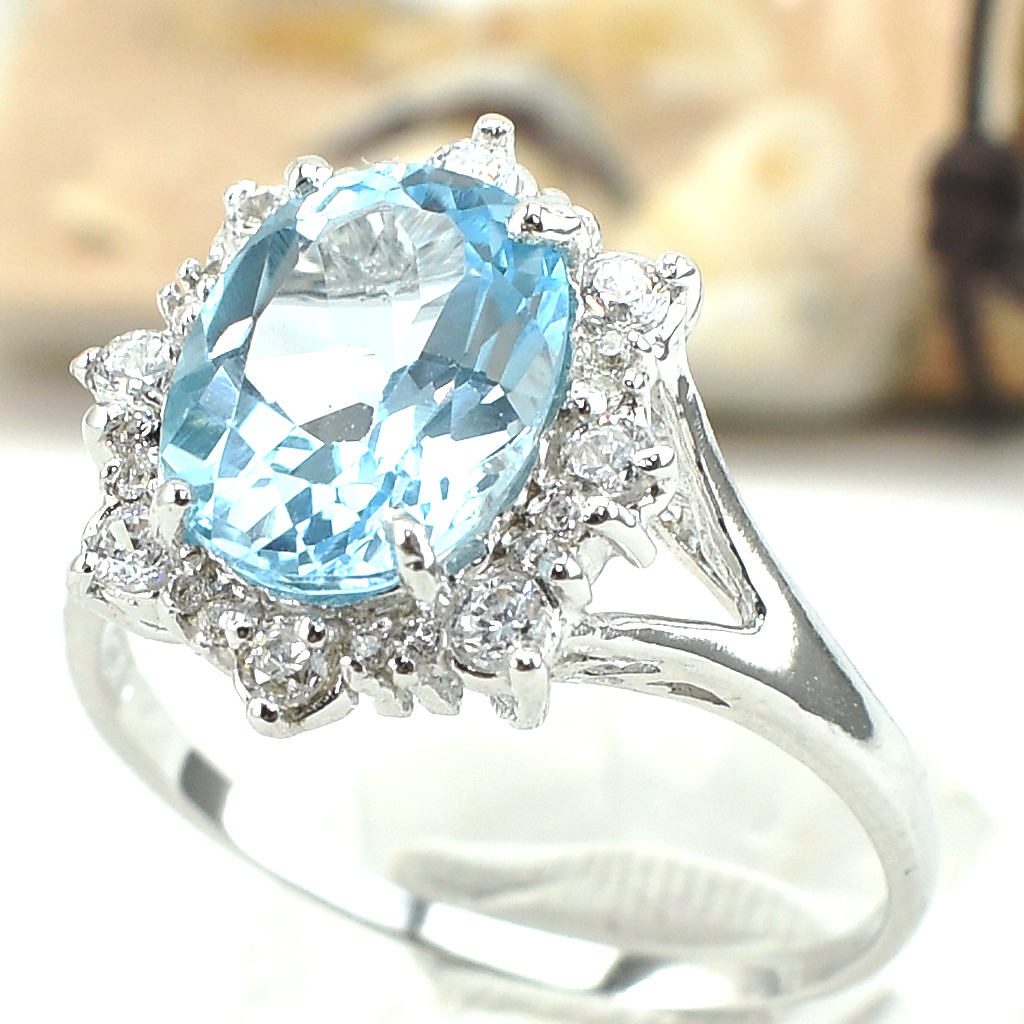 แหวนเงินแท้ราคาถูกชุบทองคำขาว สกายบลูโทปาซแท้ 3.35 กะรัต เพชรCZ 0.352 กะรัต งานประณีตสวยงาม สั่งผลิตค่ะ