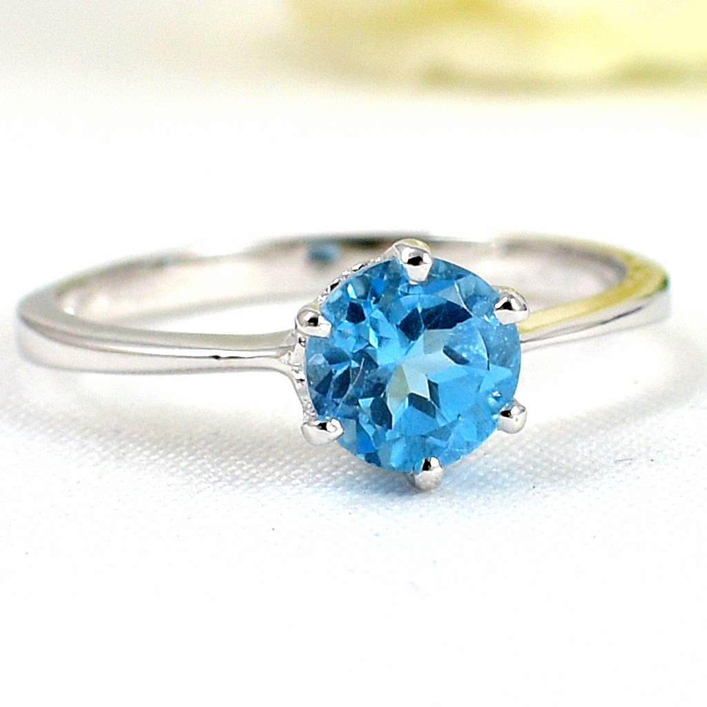 แหวนเงินแท้ราคาถูกชุบทองคำขาว สวิสบลูโทปาซแท้ 1.25 กะรัต งานประณีตสวยงาม สั่งผลิตค่ะ