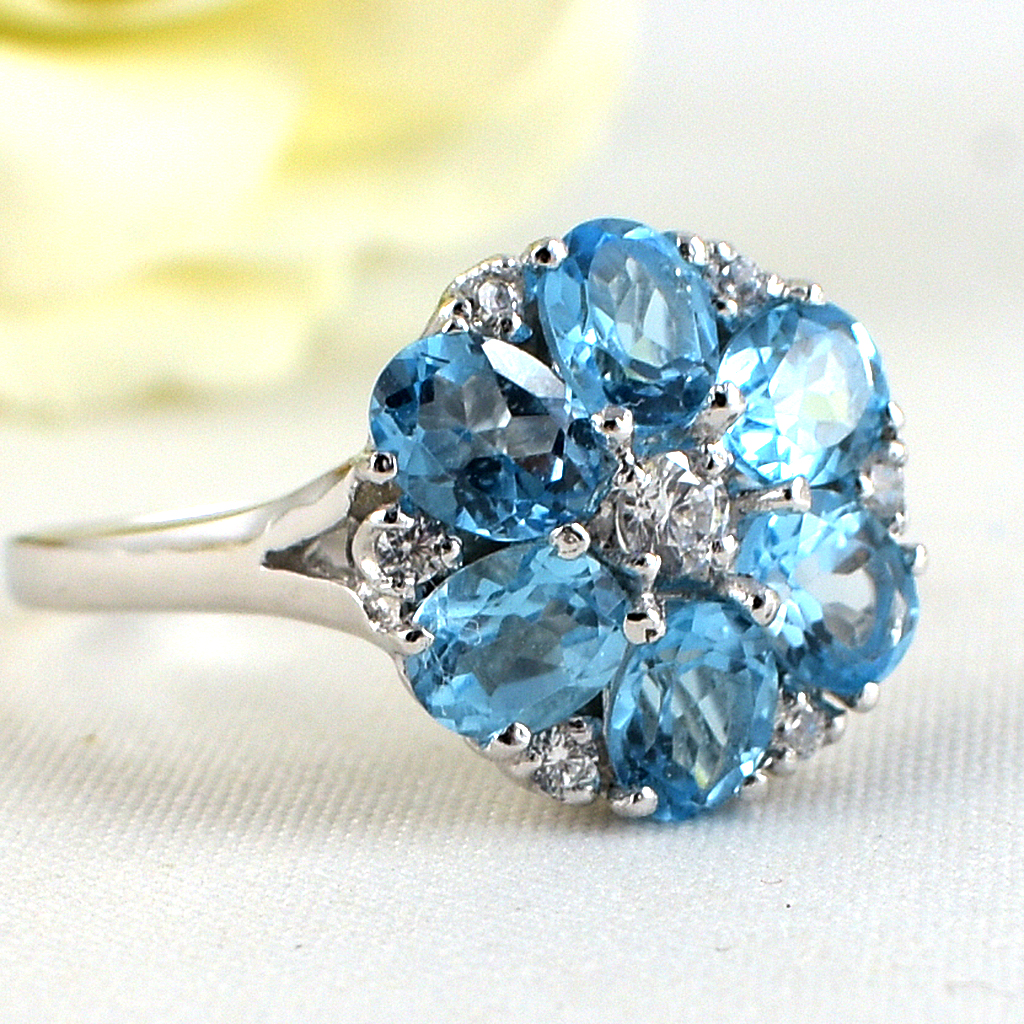 แหวนเงินแท้ราคาถูกชุบทองคำขาว สวิสบลูโทปาซแท้ 2.04 กะรัต เพชรCZ 0.41 กะรัต งานประณีตสวยงาม สั่งผลิตค่ะ