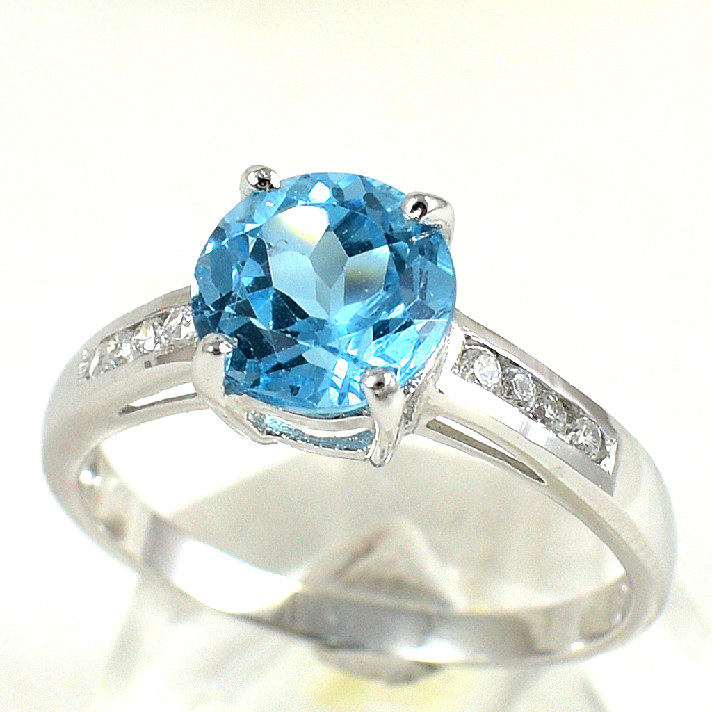 แหวนเงินแท้ราคาถูกชุบทองคำขาว สวิสบลูโทปาซแท้ 1.95 กะรัต เพชรCZ 0.06 กะรัต งานประณีตสวยงาม สั่งผลิตค่ะ