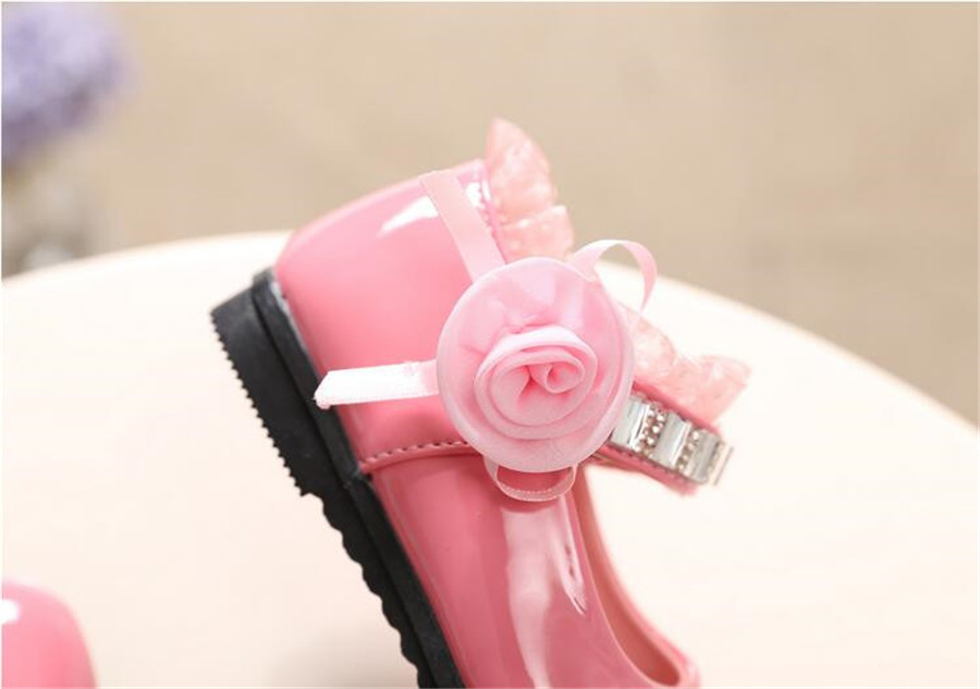 รองเท้าคัชชูหนังแก้ว ติดกุหลาบ สีชมพู โอรส