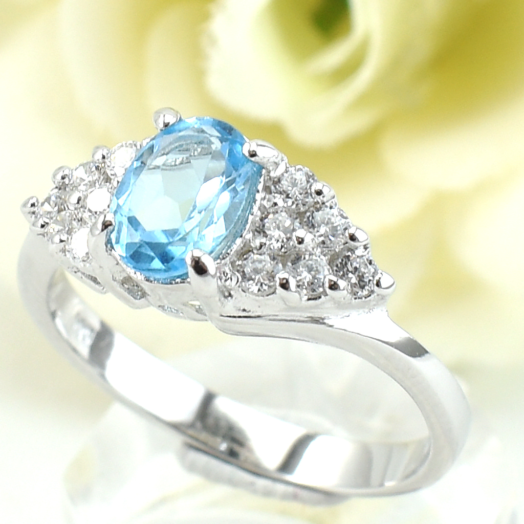 แหวนเงินแท้ราคาถูกชุบทองคำขาว สวิสบลูโทปาซแท้ 1.05 กะรัต เพชรCZ 0.36 กะรัต งานประณีตสวยงาม สั่งผลิตค่ะ