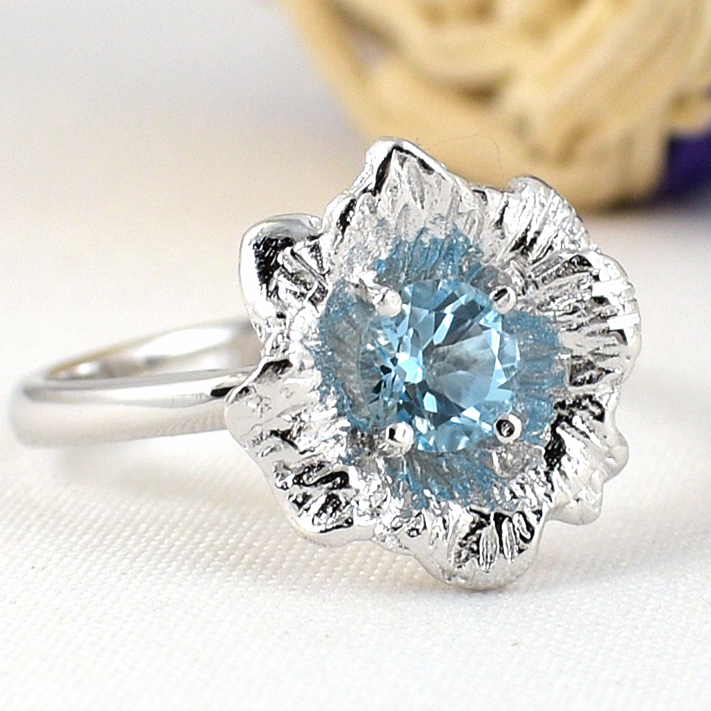 แหวนเงินแท้ราคาถูกชุบทองคำขาว สวิสบลูโทปาซแท้ 0.60 กะรัต งานประณีตสวยงาม สั่งผลิตค่ะ