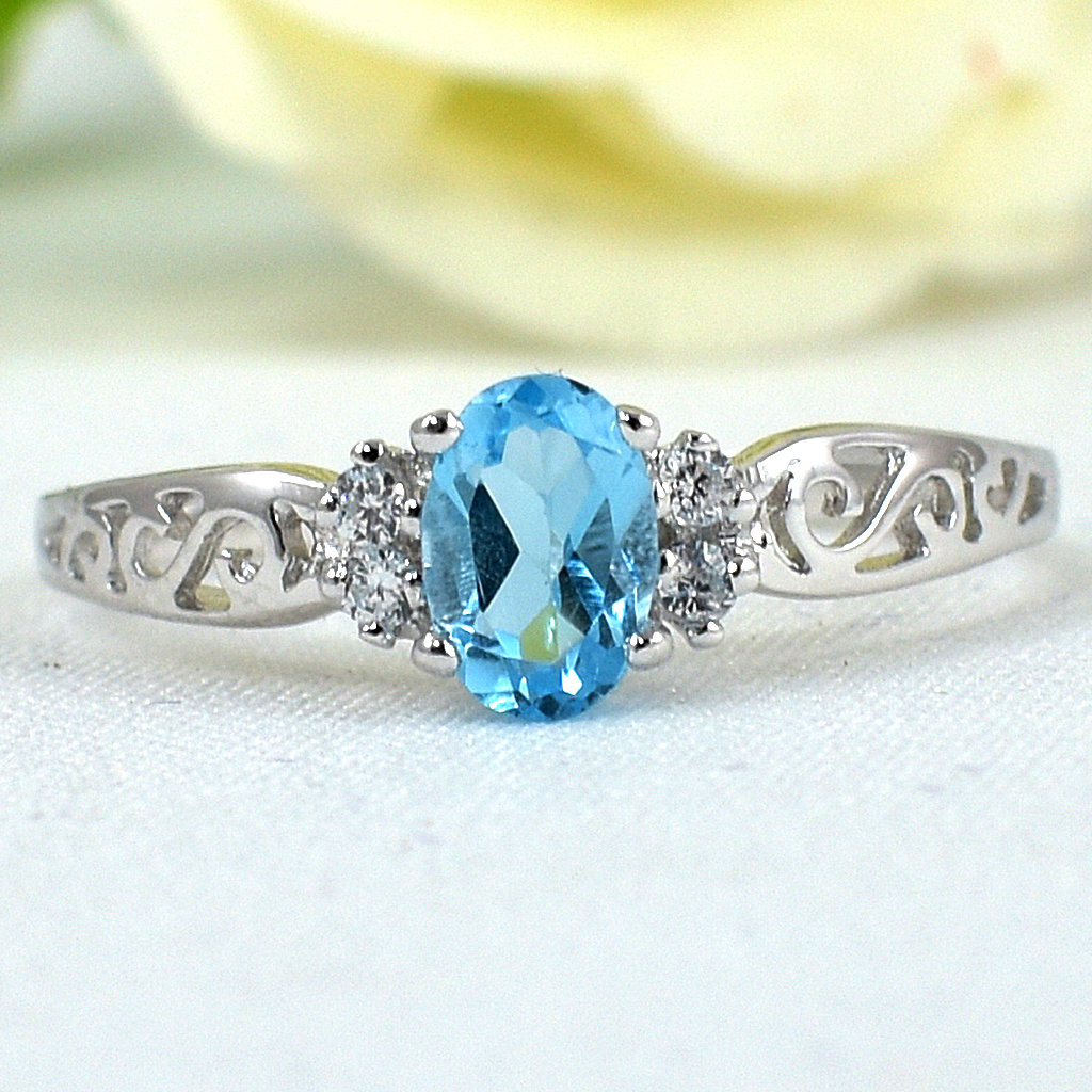 แหวนเงินแท้ราคาถูกชุบทองคำขาว สวิสบลูโทปาซแท้ 0.65 กะรัต เพชรCZ 0.04 กะรัต งานประณีตสวยงาม สั่งผลิตค่ะ