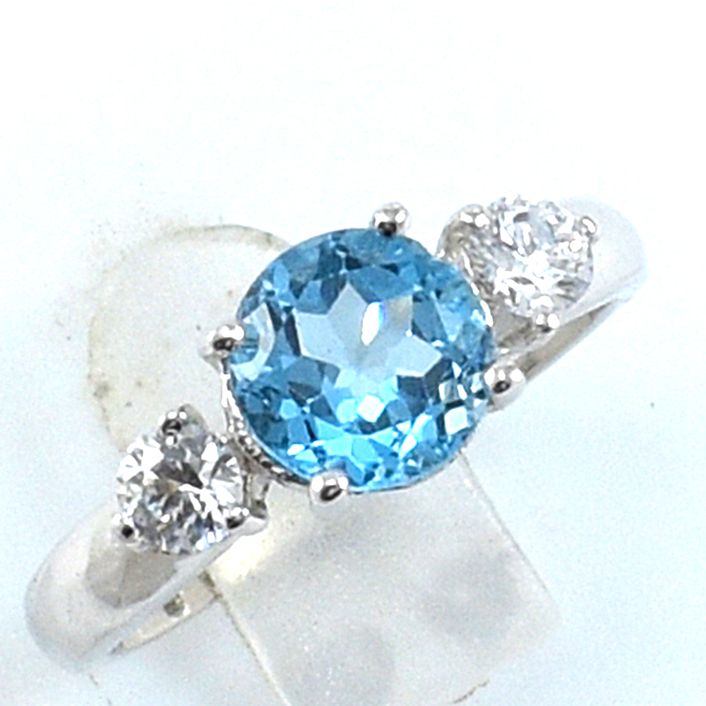 แหวนเงินแท้ราคาถูกชุบทองคำขาว สวิสบลูโทปาซแท้ 1.55 กะรัต เพชรCZ 0.030 กะรัต งานประณีตสวยงาม สั่งผลิตค่ะ