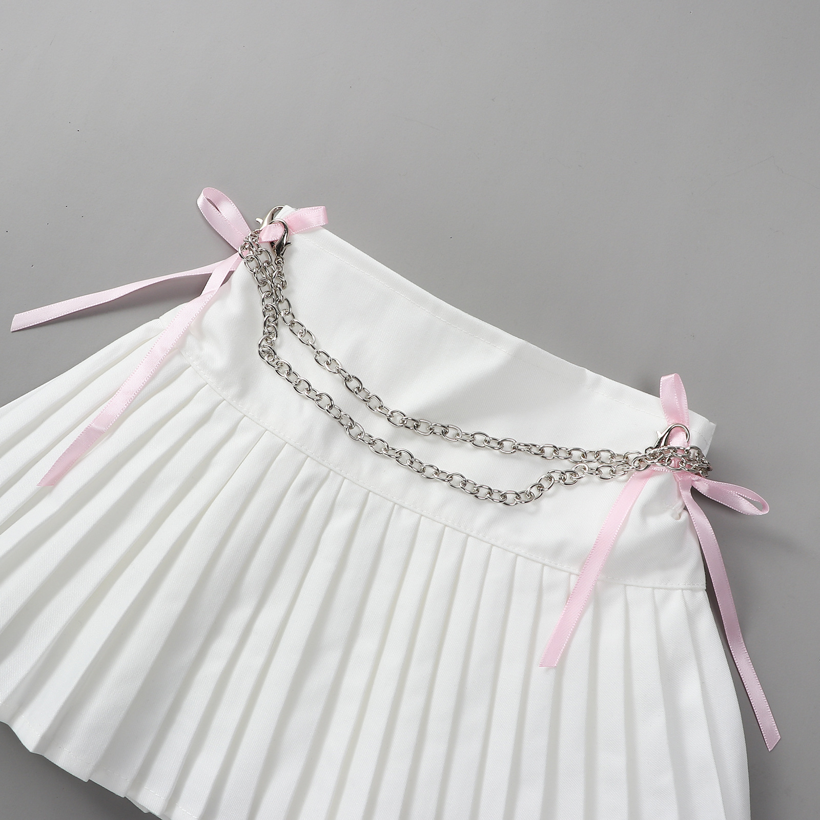 กระโปรง เด็กผู้หญิง อัดพลีส สีพื้นแยกสร้อม**พร้อมแบบโบว์ชมพู