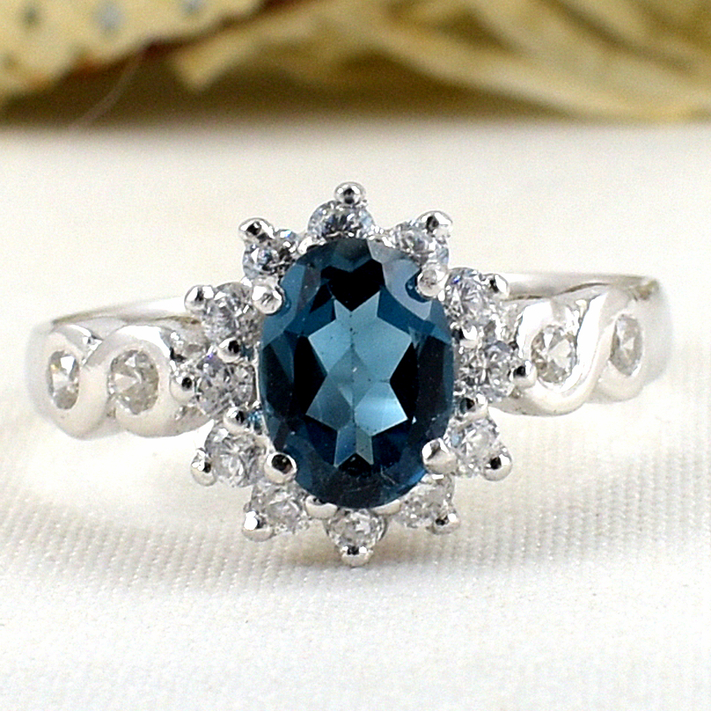 แหวนเงินแท้ราคาถูกชุบทองคำขาว ลอนดอนบลูโทปาซแท้ 0.95 กะรัต เพชรCZ 0.40 กะรัต งานประณีตสวยงาม สั่งผลิตค่ะ