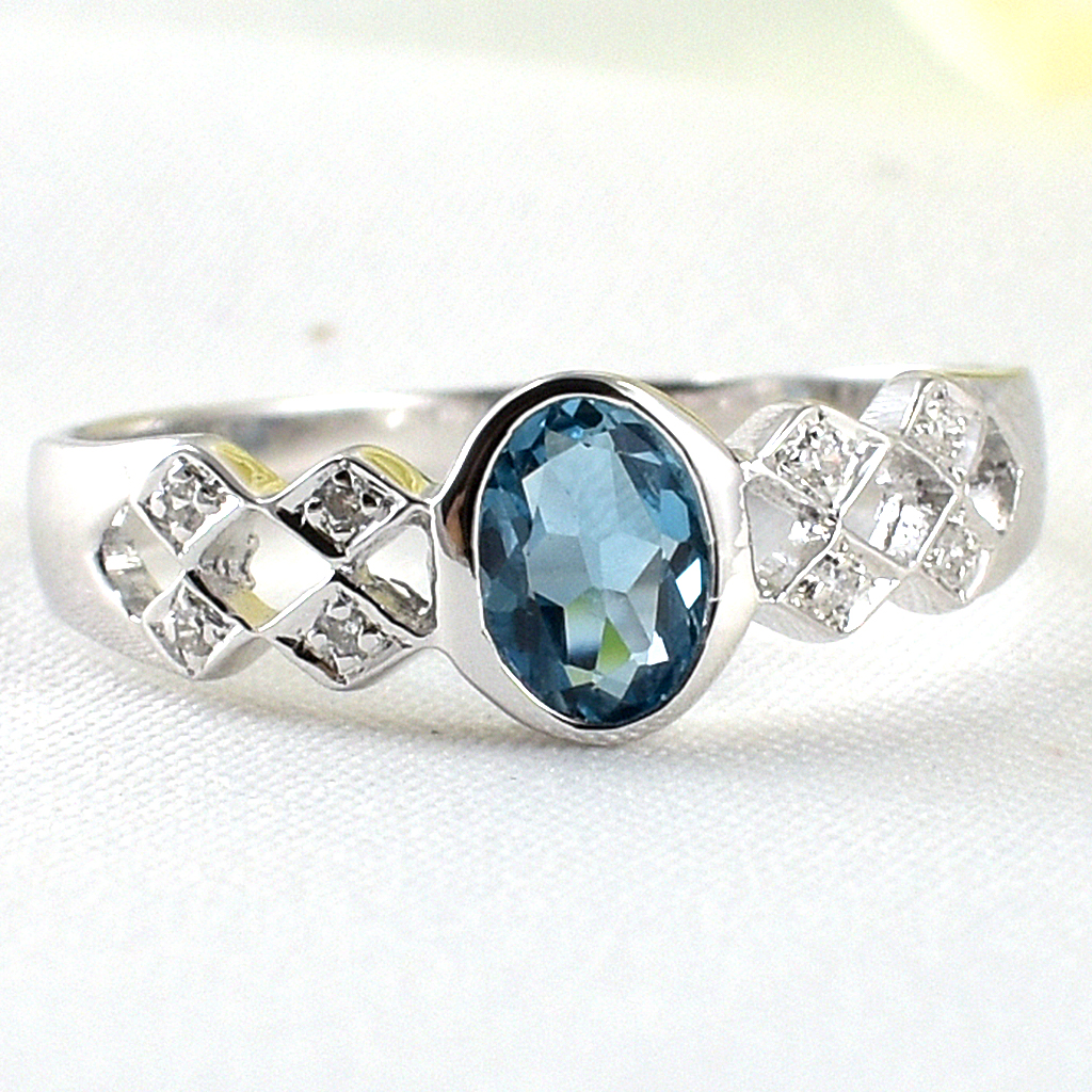 แหวนเงินแท้ราคาถูกชุบทองคำขาว ลอนดอนบลูโทปาซแท้ 0.55 กะรัต เพชรCZ 0.056 กะรัต งานประณีตสวยงาม สั่งผลิตค่ะ