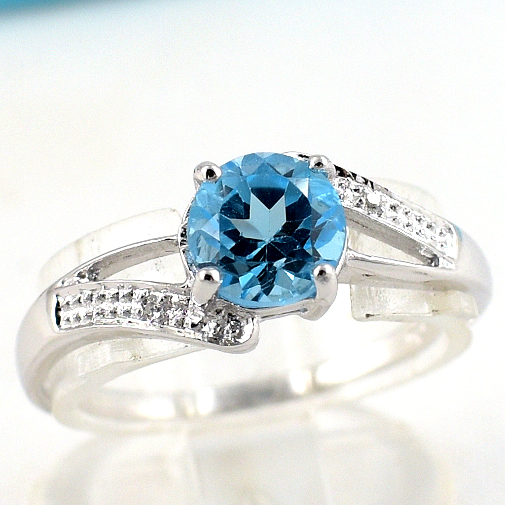 แหวนเงินแท้ราคาถูกชุบทองคำขาว สวิสบลูโทปาซแท้ 0.80 กะรัต เพชรCZ 0.02 กะรัต งานประณีตสวยงาม สั่งผลิตค่ะ