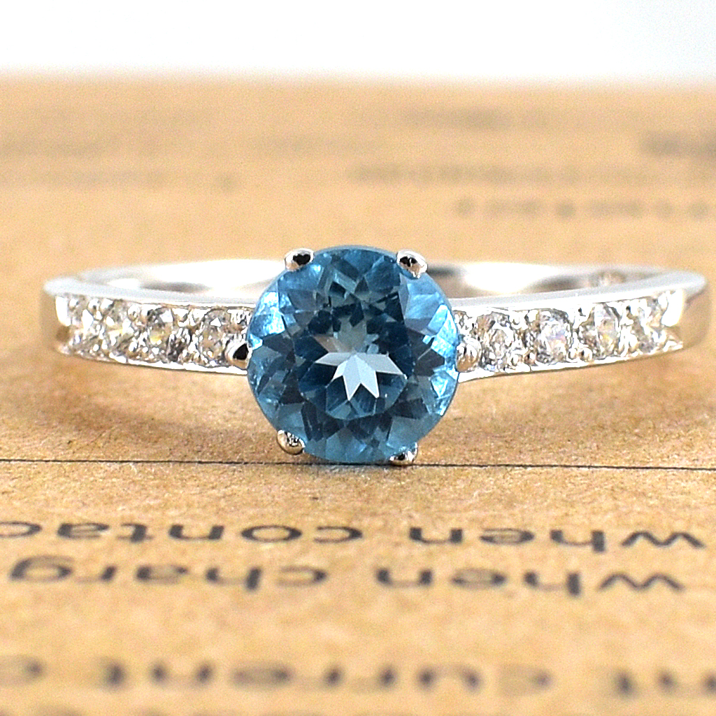 แหวนเงินแท้ราคาถูกชุบทองคำขาว สวิสบลูโทปาซแท้ 0.92 กะรัต เพชรCZ 0.20 กะรัต งานประณีตสวยงาม สั่งผลิตค่ะ