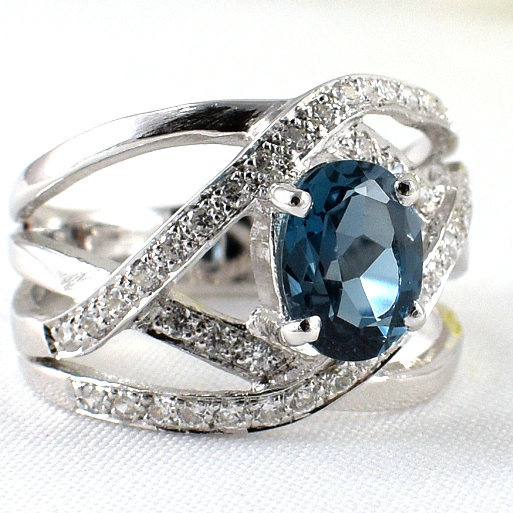 แหวนเงินแท้ราคาถูกชุบทองคำขาว ลอนดอนบลูโทปาซแท้ 1.45 กะรัต เพชรCZ 0.38 กะรัต งานประณีตสวยงาม สั่งผลิตค่ะ