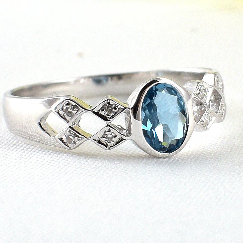 แหวนเงินแท้ราคาถูกชุบทองคำขาว ลอนดอนบลูโทปาซแท้ 0.55 กะรัต เพชรCZ 0.056 กะรัต งานประณีตสวยงาม สั่งผลิตค่ะ