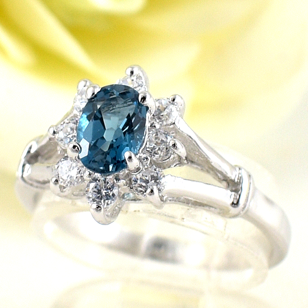 แหวนเงินแท้ราคาถูกชุบทองคำขาว ลอนดอนบลูโทปาซแท้ 0.55 กะรัต เพชรCZ 0.24 กะรัต งานประณีตสวยงาม สั่งผลิตค่ะ