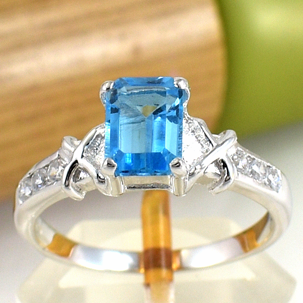 แหวนเงินแท้ราคาถูกชุบทองคำขาว สวิสบลูโทปาซแท้ 1.25 กะรัต เพชรCZ 0.18 กะรัต งานประณีตสวยงาม สั่งผลิตค่ะ