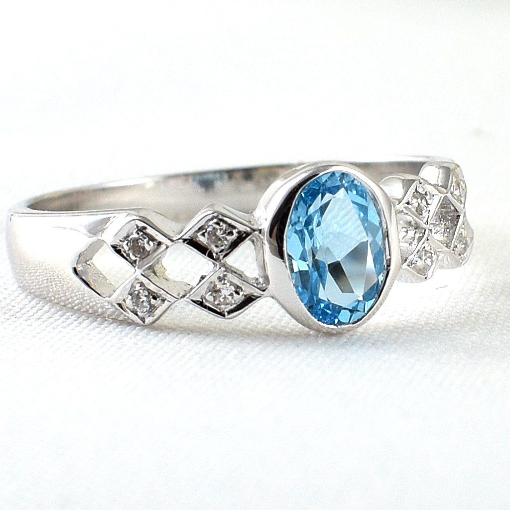 แหวนเงินแท้ราคาถูกชุบทองคำขาว สวิสบลูโทปาซแท้ 0.65 กะรัต เพชรCZ 0.056 กะรัต งานประณีตสวยงาม สั่งผลิตค่ะ