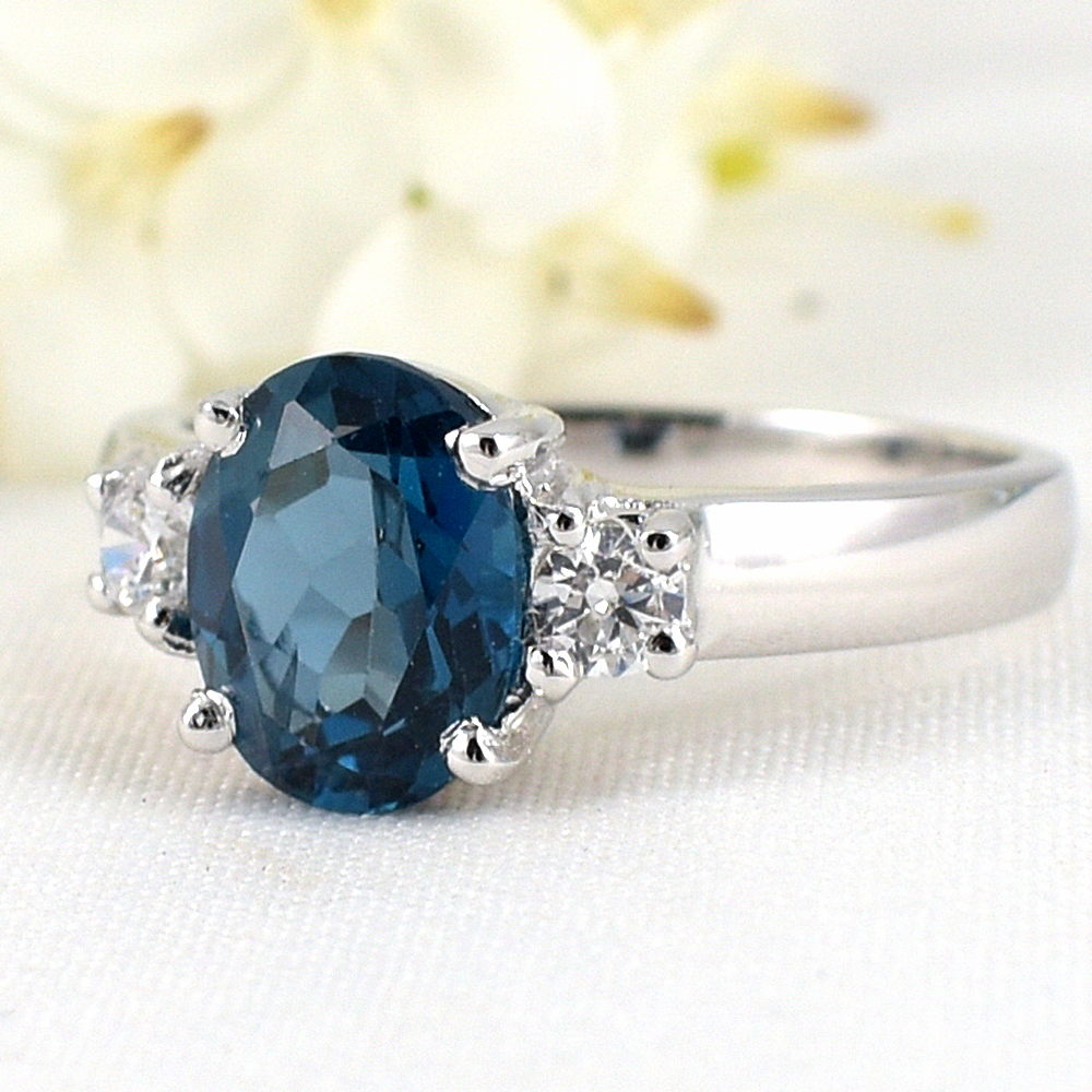 แหวนเงินแท้ราคาถูกชุบทองคำขาว ลอนดอนบลูโทปาซแท้ 2.35 กะรัต เพชรCZ 0.20 กะรัต งานประณีตสวยงาม สั่งผลิตค่ะ