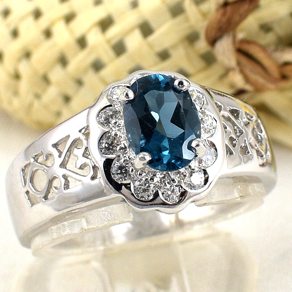 แหวนเงินแท้ราคาถูกชุบทองคำขาว ลอนดอนบลูโทปาซแท้ 0.95 กะรัต เพชรCZ 0.18 กะรัต งานประณีตสวยงาม สั่งผลิตค่ะ