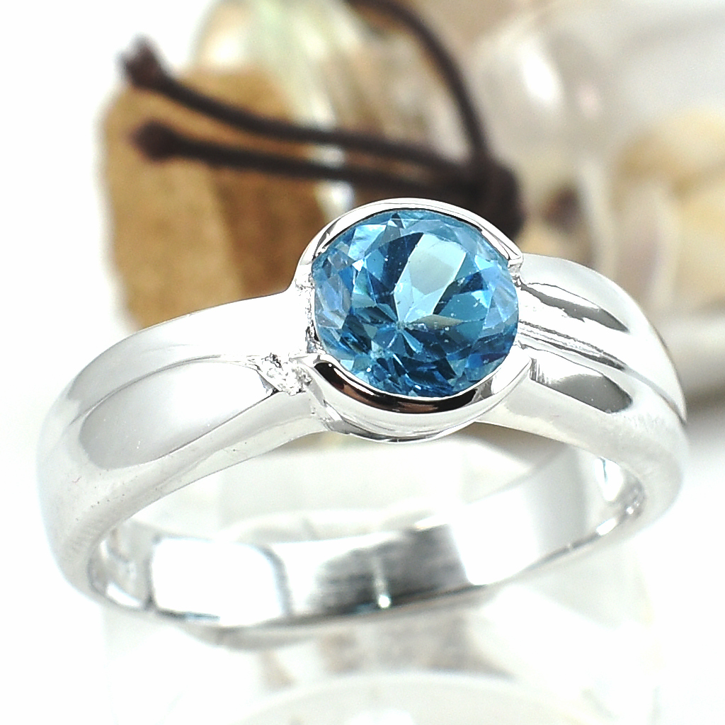 แหวนเงินแท้ราคาถูกชุบทองคำขาว สวิสบลูโทปาซแท้ 1.35 กะรัต งานประณีตสวยงาม สั่งผลิตค่ะ