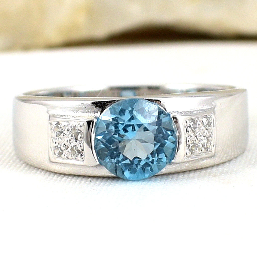 แหวนเงินแท้ราคาถูกชุบทองคำขาว สวิสบลูโทปาซแท้ 1.0 กะรัต เพชรCZ 0.056 กะรัต งานประณีตสวยงาม สั่งผลิตค่ะ