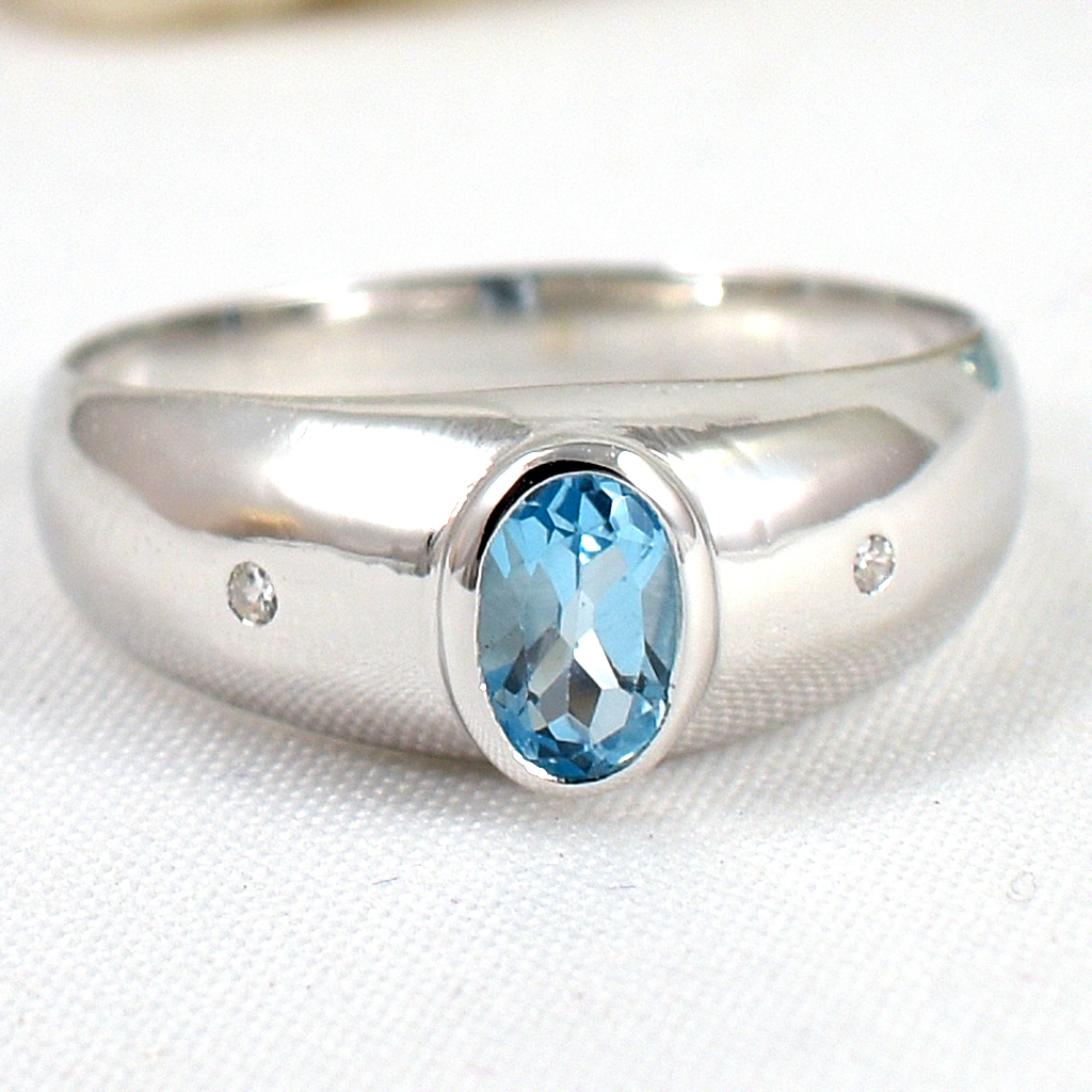 แหวนเงินแท้ราคาถูกชุบทองคำขาว สวิสบลูโทปาซแท้ 0.65 กะรัต เพชรCZ 0.02 กะรัต งานประณีตสวยงาม สั่งผลิตค่ะ