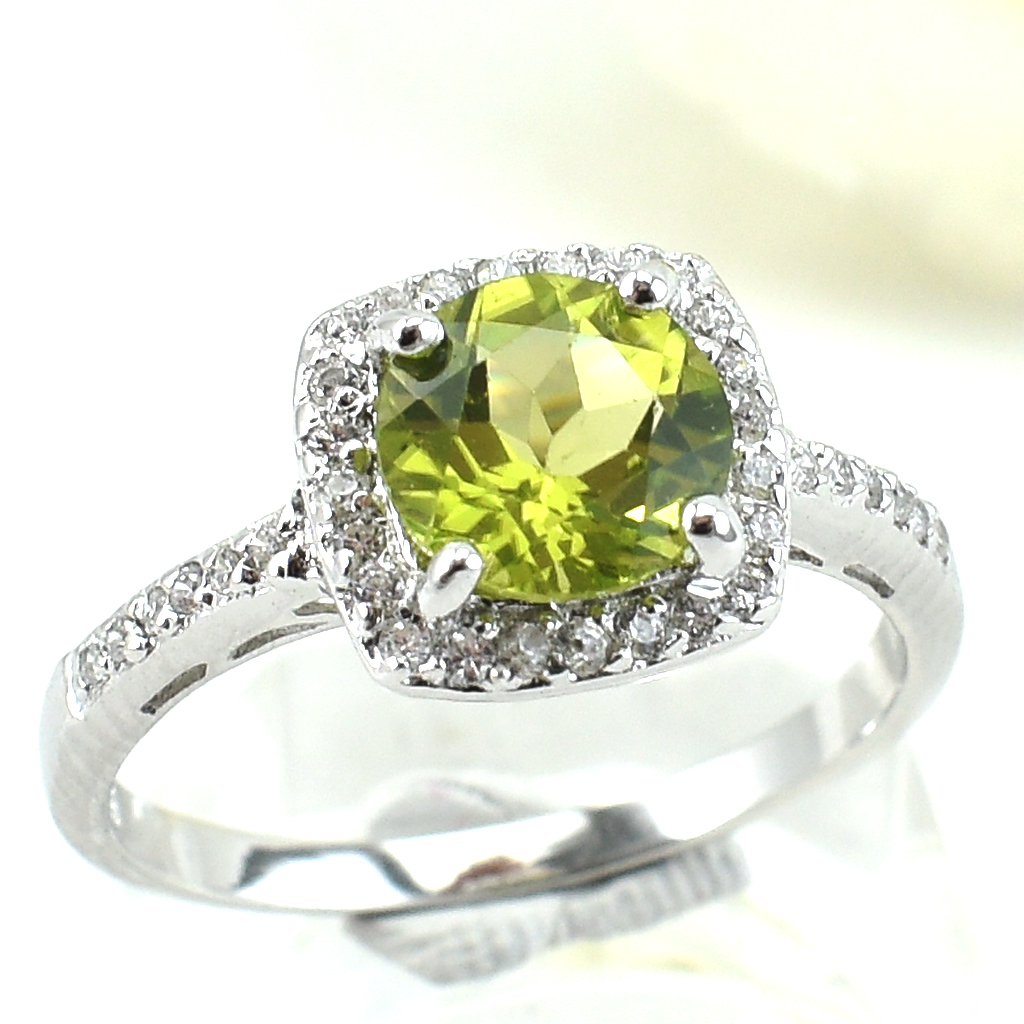 แหวนเงินแท้ราคาถูกชุบทองคำขาว เพอริดอทแท้ 1.65 กะรัต เพชรCZ 0.252 กะรัต งานประณีตสวยงาม สั่งผลิตค่ะ