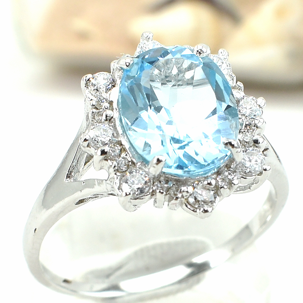 แหวนเงินแท้ราคาถูกชุบทองคำขาว สกายบลูโทปาซแท้ 3.35 กะรัต เพชรCZ 0.352 กะรัต งานประณีตสวยงาม สั่งผลิตค่ะ