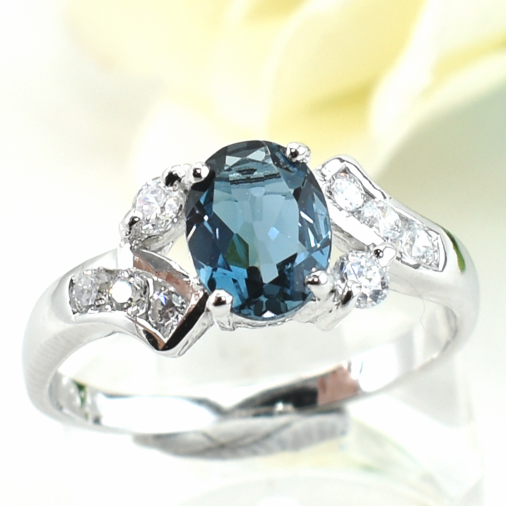 แหวนเงินแท้ราคาถูกชุบทองคำขาว ลอนดอนบลูโทปาซแท้ 1.65 กะรัต เพชรCZ 0.21 กะรัต งานประณีตสวยงาม สั่งผลิตค่ะ