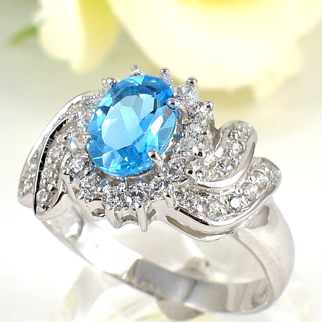 แหวนเงินแท้ราคาถูกชุบทองคำขาว สวิสบลูโทปาซแท้ 1.85 กะรัต เพชรCZ 0.44 กะรัต งานประณีตสวยงาม สั่งผลิตค่ะ