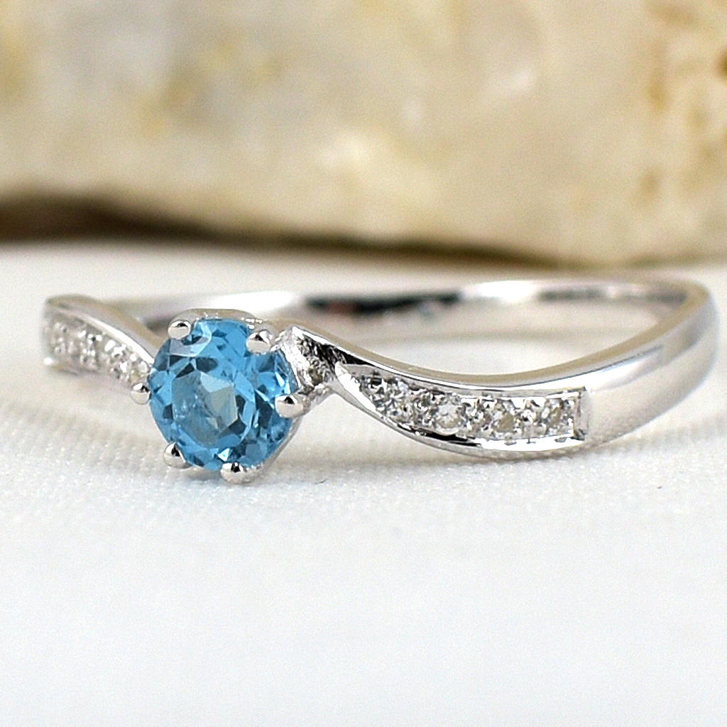 แหวนเงินแท้ราคาถูกชุบทองคำขาว สวิสบลูโทปาซแท้ 0.35 กะรัต เพชรCZ 0.056 กะรัต งานประณีตสวยงาม สั่งผลิตค่ะ