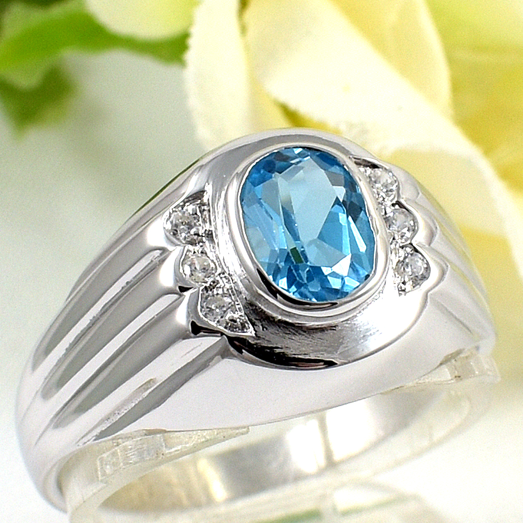 แหวนเงินแท้ราคาถูกชุบทองคำขาว สวิสบลูโทปาซแท้ 0.95 กะรัต เพชรCZ 0.06 กะรัต งานประณีตสวยงาม สั่งผลิตค่ะ