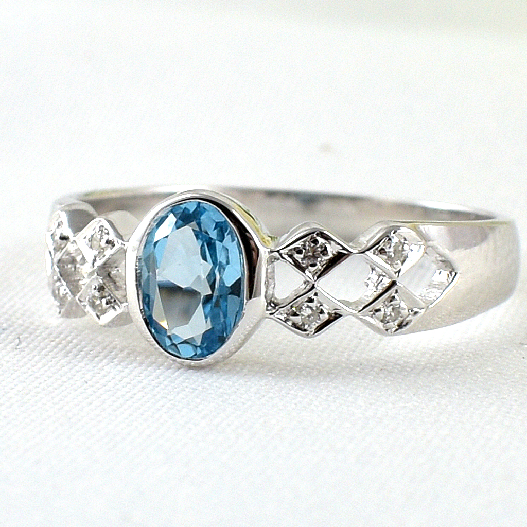 แหวนเงินแท้ราคาถูกชุบทองคำขาว สวิสบลูโทปาซแท้ 0.65 กะรัต เพชรCZ 0.056 กะรัต งานประณีตสวยงาม สั่งผลิตค่ะ