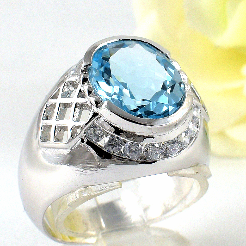 แหวนเงินแท้ราคาถูกชุบทองคำขาว สกายบลูโทปาซแท้ 5.75 กะรัต เพชรCZ 0.48 กะรัต งานประณีตสวยงาม สั่งผลิตค่ะ