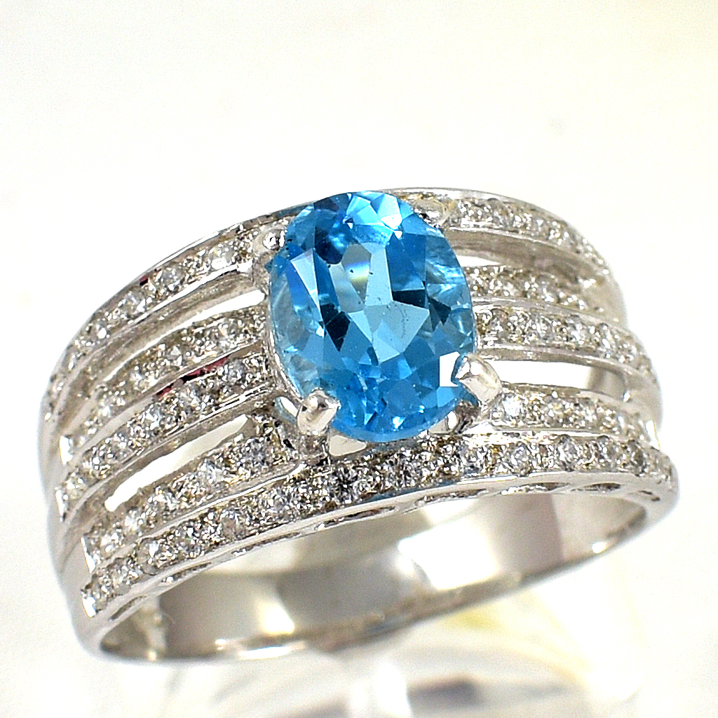 แหวนเงินแท้ราคาถูกชุบทองคำขาว สวิสบลูโทปาซแท้ 1.85 กะรัต เพชรCZ 0.62 กะรัต งานประณีตสวยงาม สั่งผลิตค่ะ